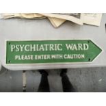 A CAST 'PSYCHIATRIC WARD' SIGN