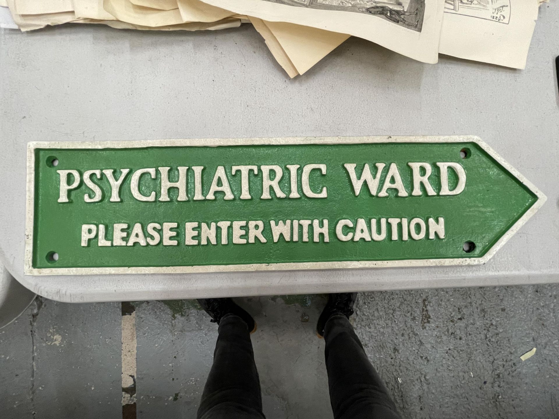 A CAST 'PSYCHIATRIC WARD' SIGN