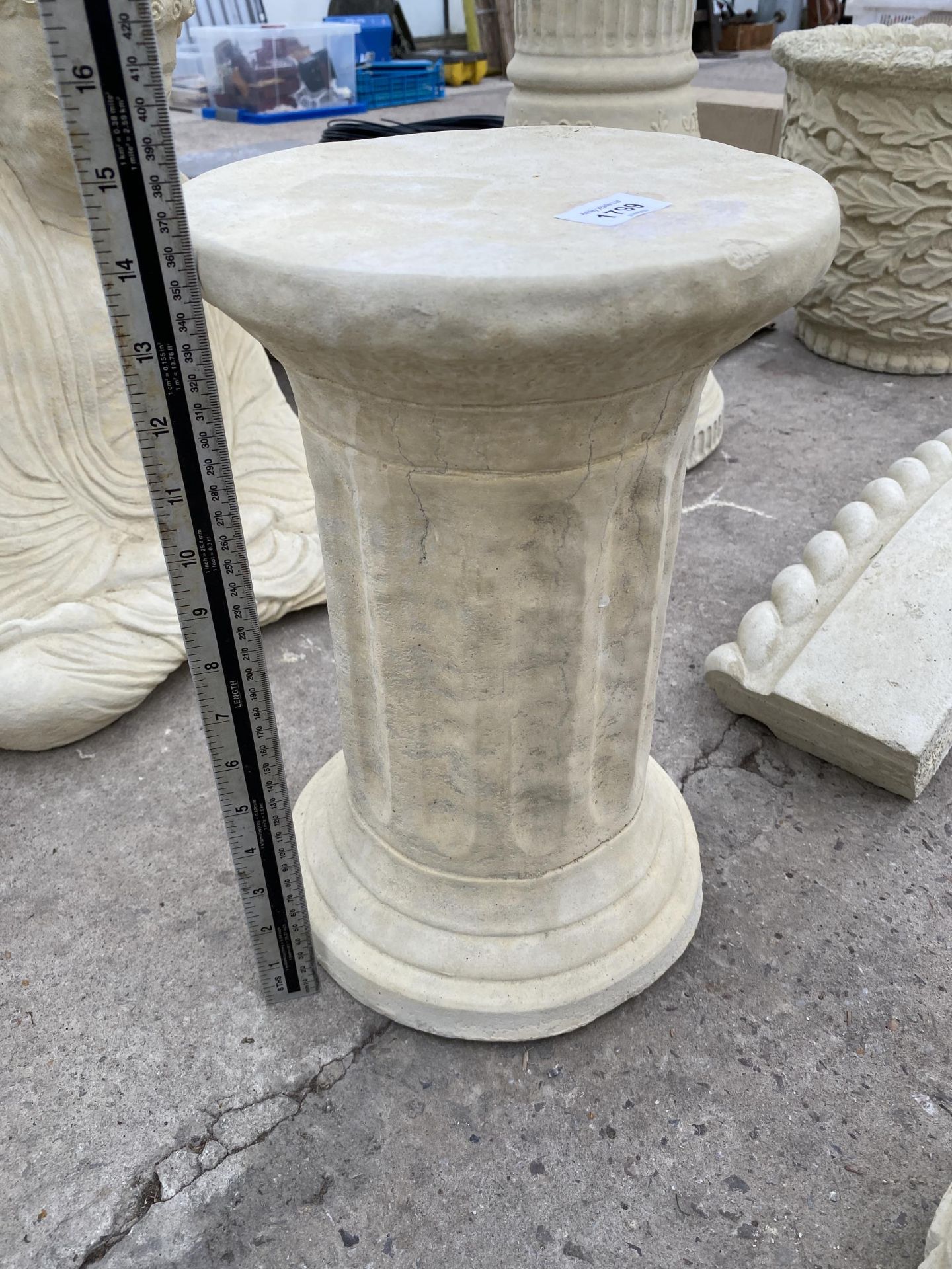 AN AS NEW EX DISPLAY CONCRETE SMALL PLINTH *PLEASE NOTE VAT TO BE PAID ON THIS ITEM*