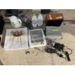 AN ASSORTMENT OF ITEMS TO INCLUDE PS2 CONTROLLERS, SPEAKERS AND A HEATER ETC