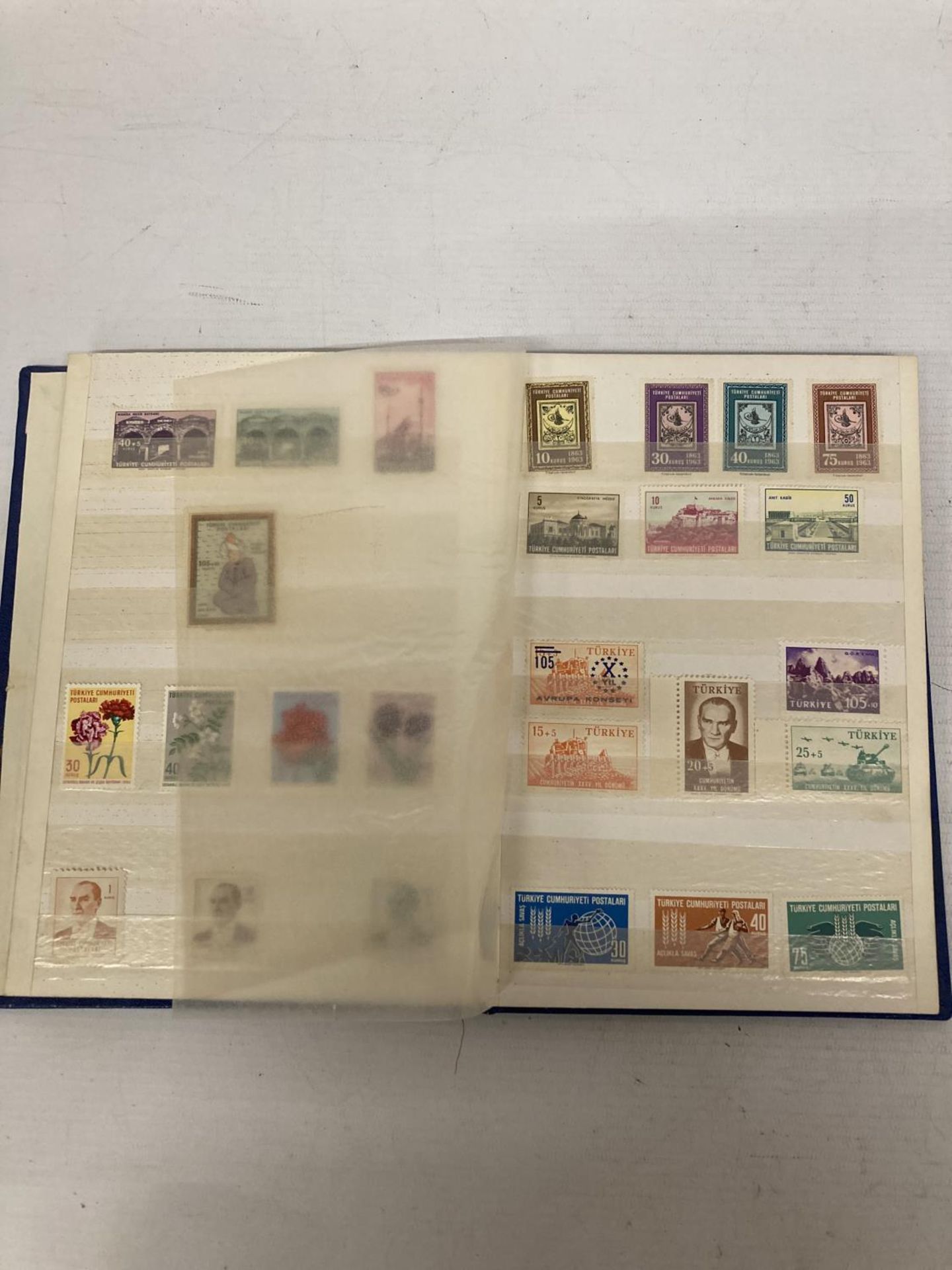 TURKEY , A 1950’S TO 1960’S , UNMOUNTED MINT COLLECTION IN BLUE STOCK BOOK . MANY COMPLETE SETS TO - Image 2 of 3