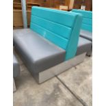 A MODERN DOUBLE SIDED BOOTH SEATING IN TURQUOISE AND GREY