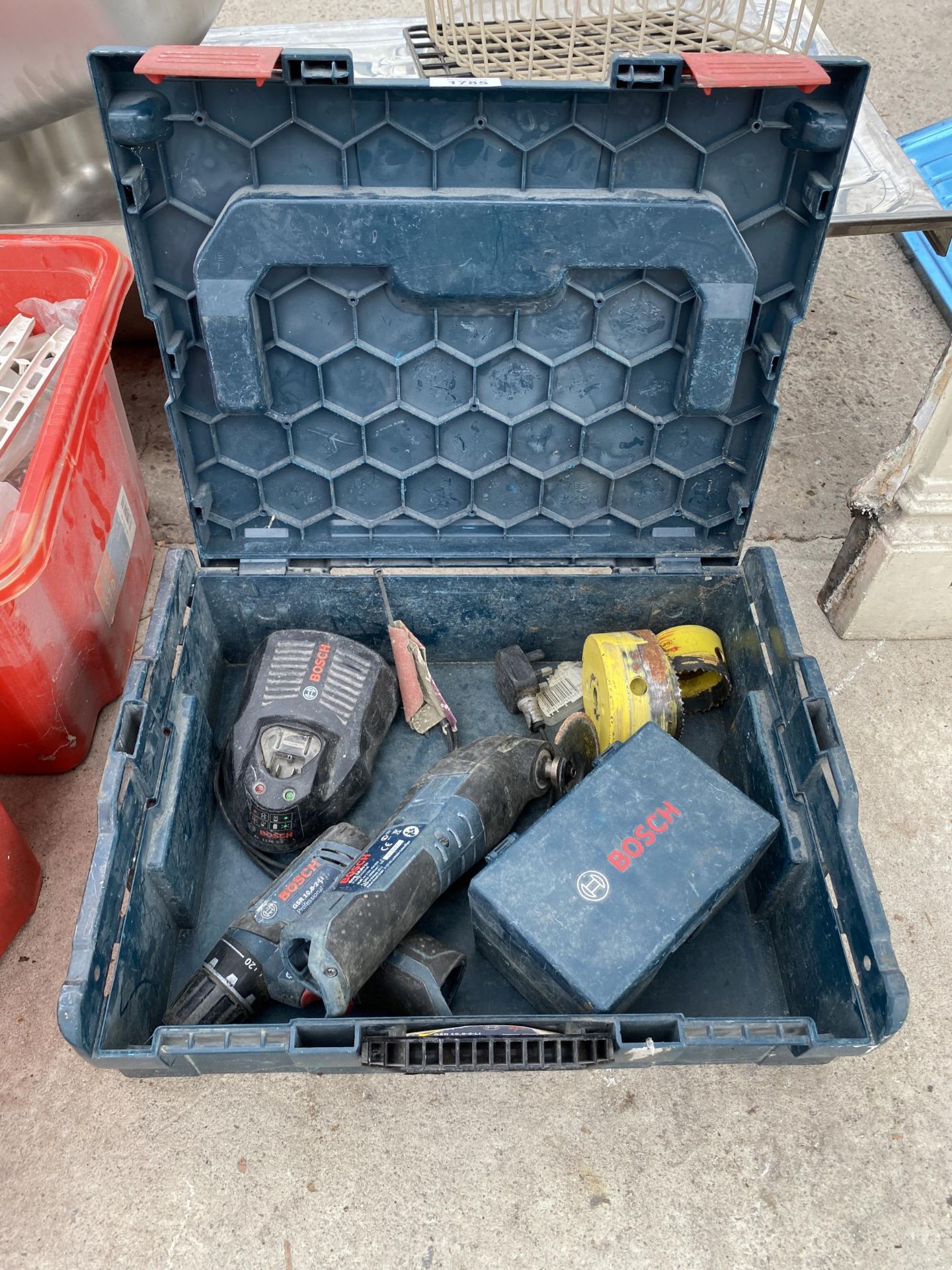 A COLLECTION OF BOSCH POWER TOOLS TO INCLUDE, DRILL AND GRINDER