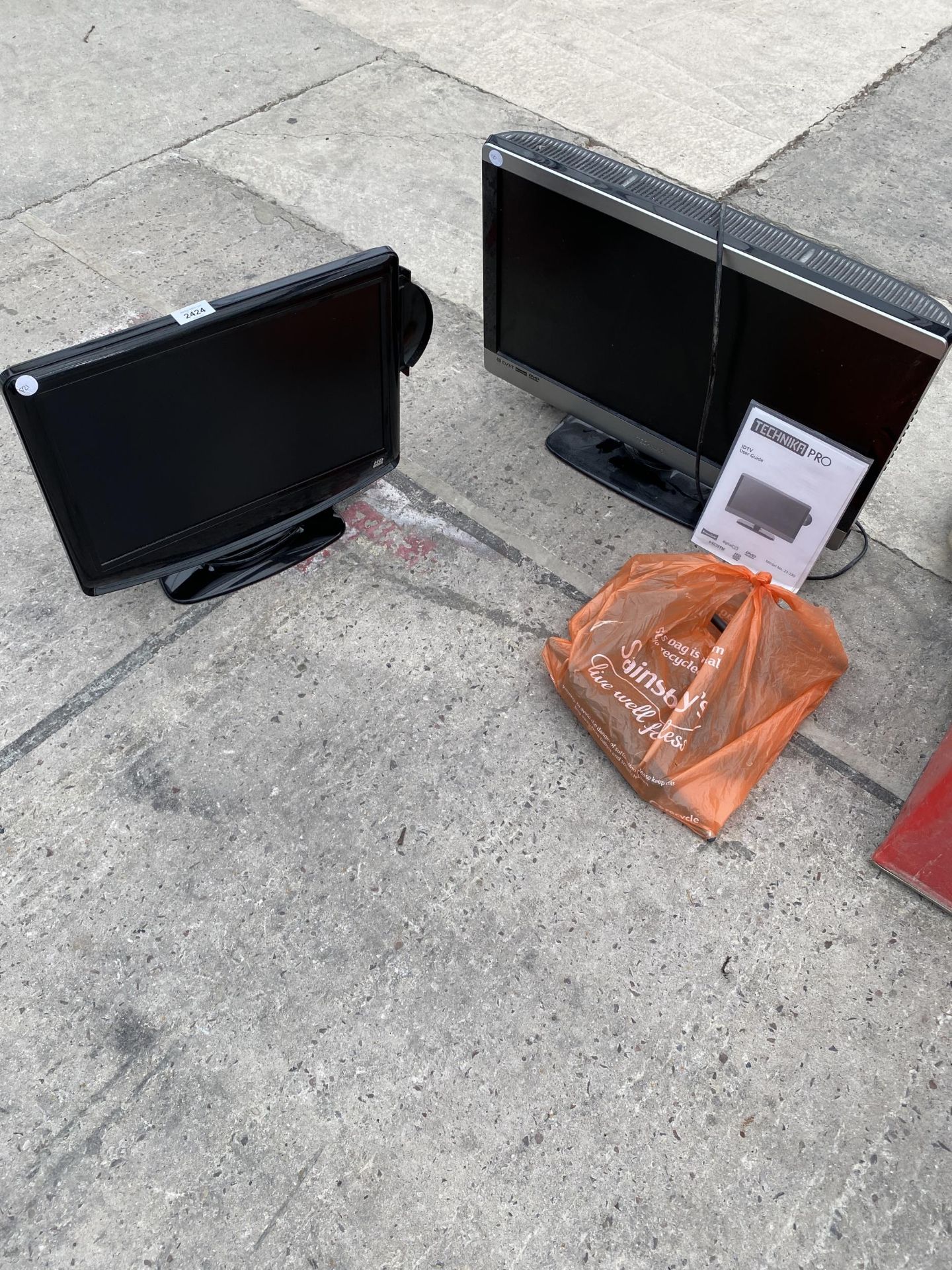 A TECHNIKA 23" TELEVISION AND A FURTHER TELEVISION