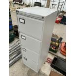 A TRIUMPH FOUR DRAWER METAL FILING CABINET