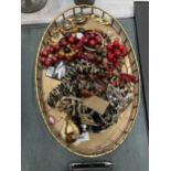 A VINTAGE GALLERIED BRASS TRAY CONTAINING A QUANTITY OF COSTUME JEWELLERY TO INCLUDE NECKLACES,