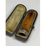 A HALLMARKED BIRMINGHAM SILVER AND AMBER CHEROOT HOLDER IN ORIGINAL PRESENTATION CASE