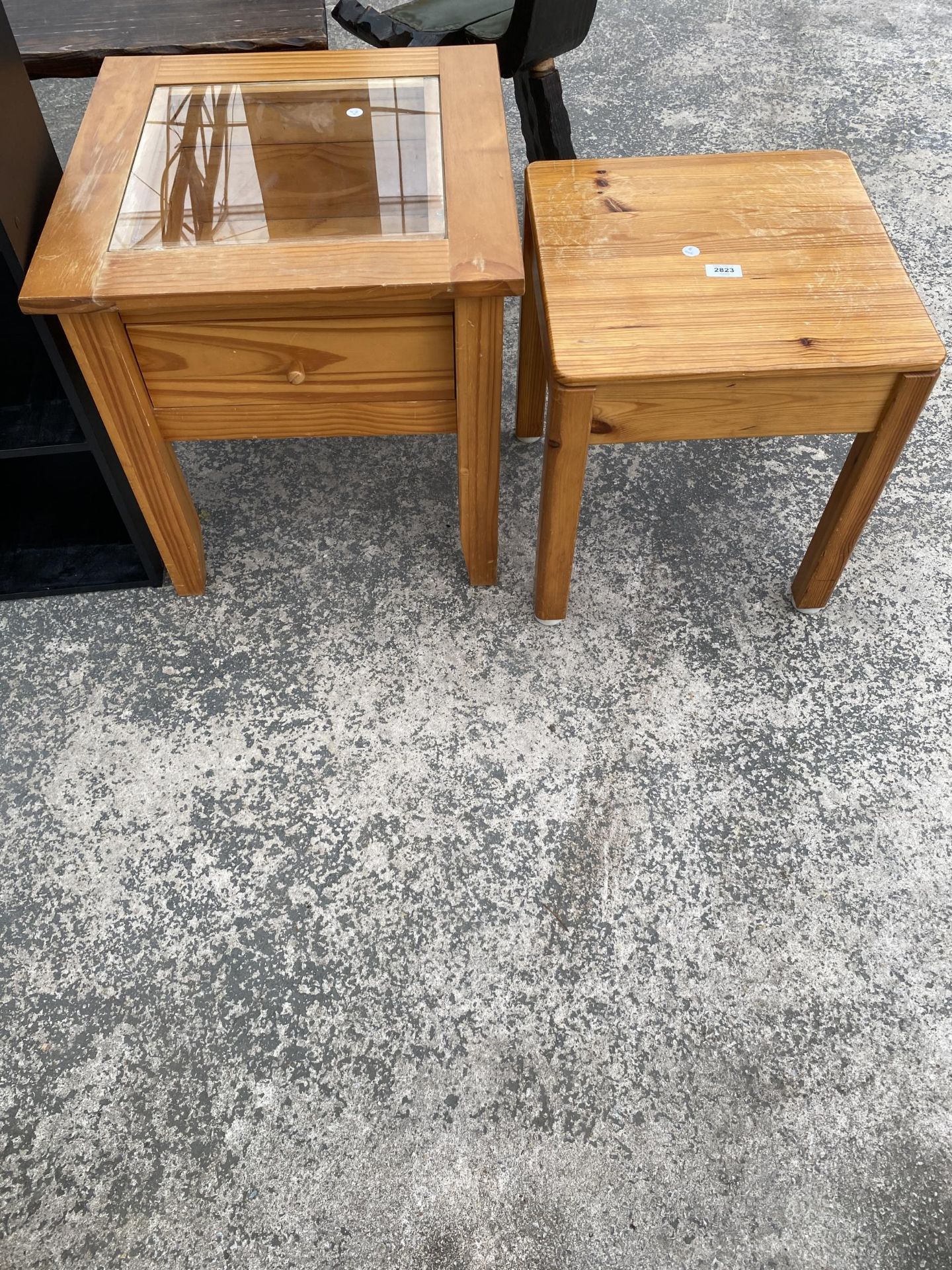 A PINE STOOL AND PINE LAMP TABLE WITH DRAWER AND GLASS TOP