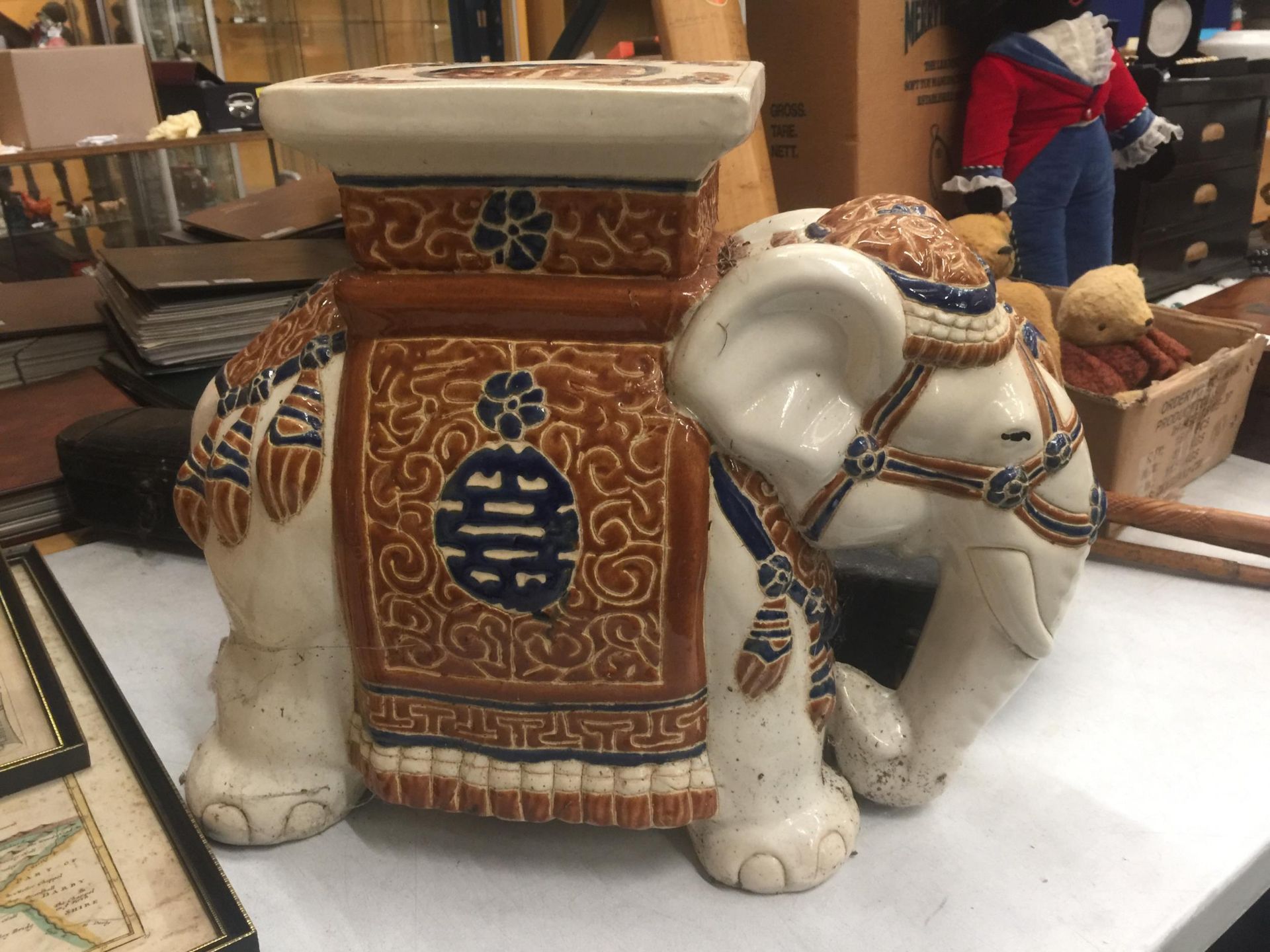 A LARGE CERAMIC ELEPHANT PLANT STAND/SEAT