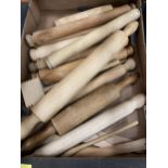 A BOX OF WOODEN ROLLING PINS