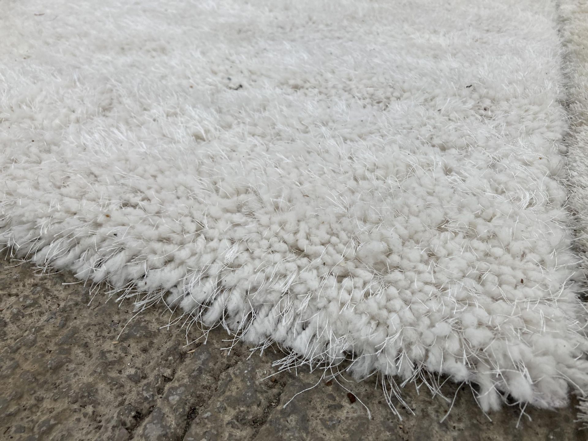 A MODERN CREAM SHAGGY RUG - Image 2 of 2