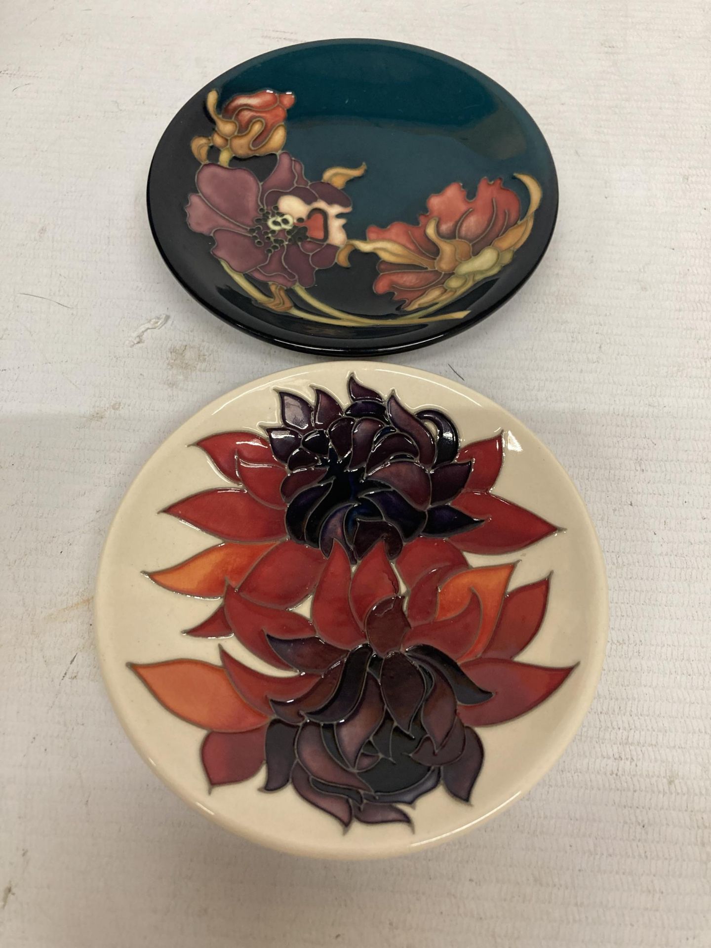 TWO MOORCROFT PIN DISHES (WITH RED DOTS)