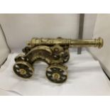 A VINTAGE BRASS MODEL OF A CANNON