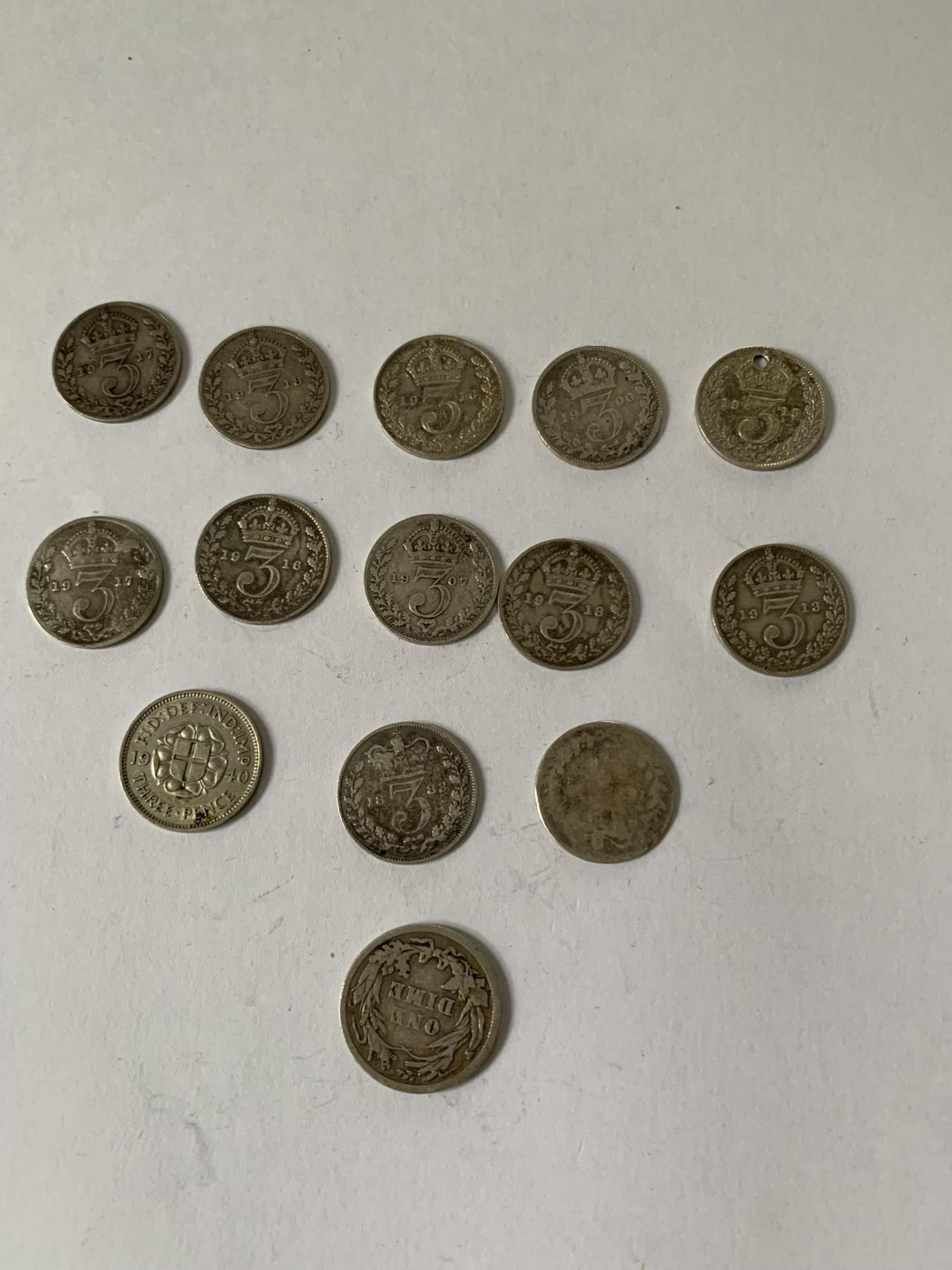 14 SILVER COINS - 13 THREE PENNY AND A USA DIME