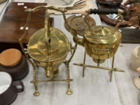 TWO VINTAGE BRASS KETTLES ON STANDS