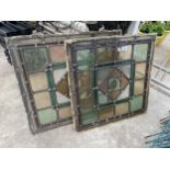 A PAIR OF VINTAGE LEADED STAIN GLASS WINDOWS (A/F)