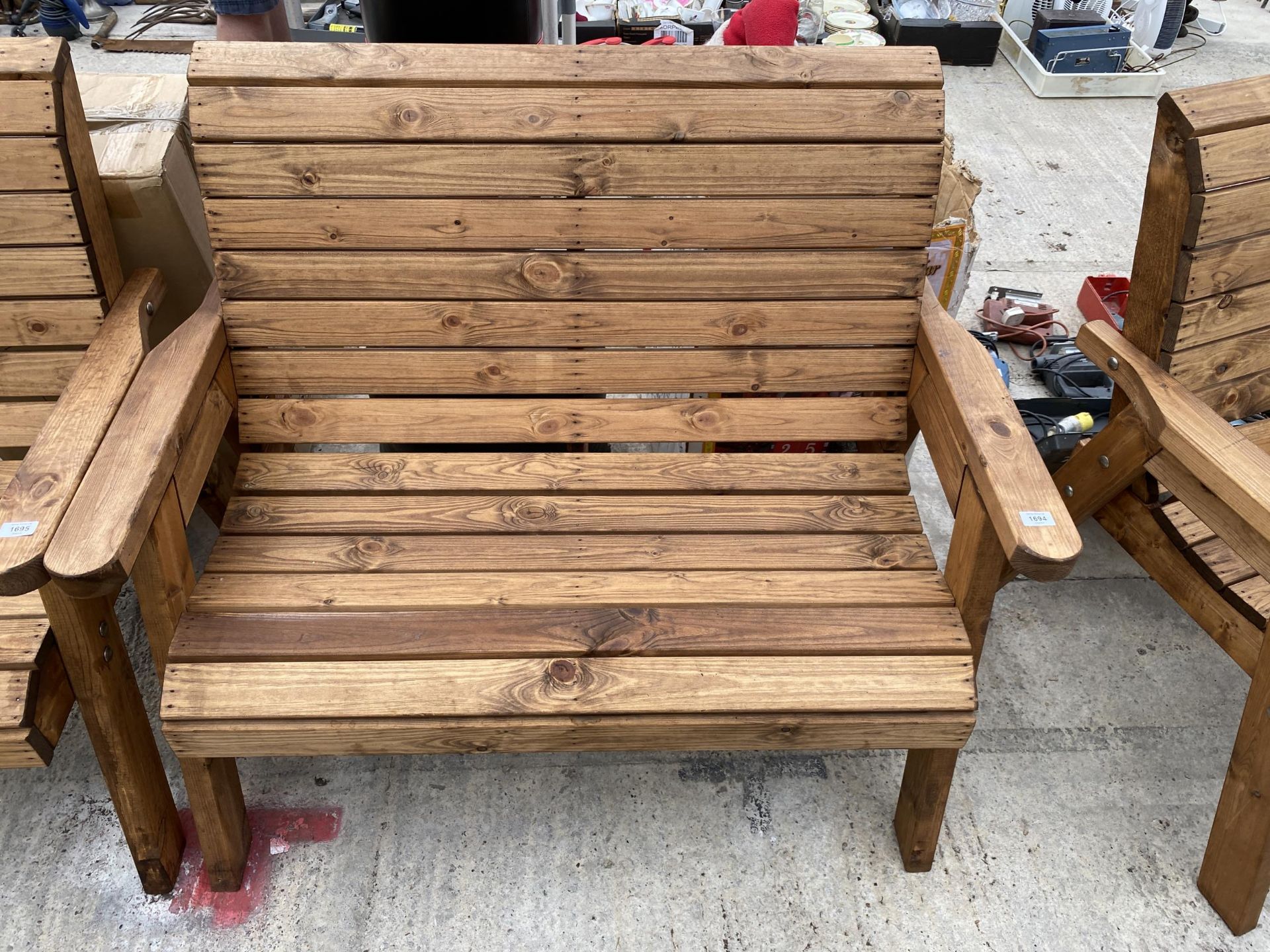 AN AS NEW EXDISPLAY CHARLES TAYLOR TWO SEATER BENCH *PLEASE NOTE VAT TO BE PAID ON THIS LOT*