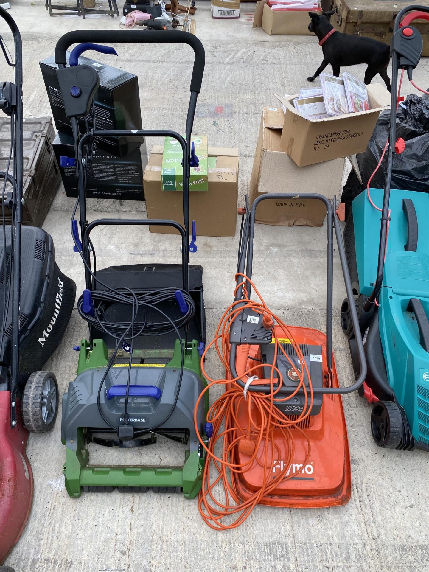 TWO ELECTRIC LAWN MOWERS, A FLYMO AND A POWERBASE