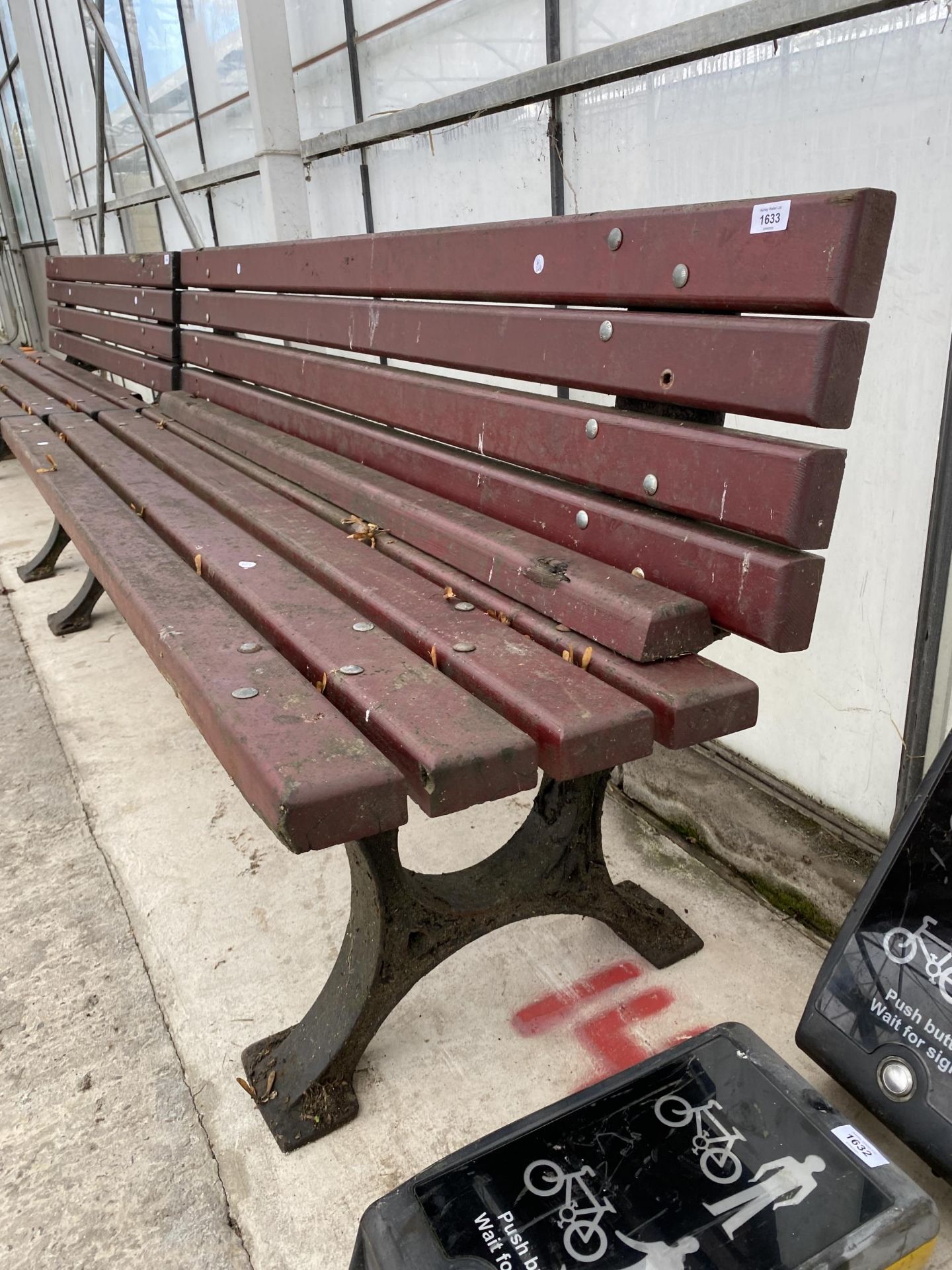 A LARGE HEAVY DUTY WOODEN SLATTED PARK BENCH WITH HEAVY CAST ENDS (L:200CM) - Image 2 of 2