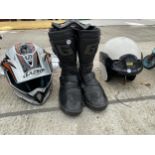 TWO MOTORBIKE HELMETS AND A PAIR OF BOOTS