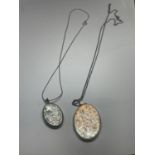 TWO SILVER LOCKETS ON CHAINS