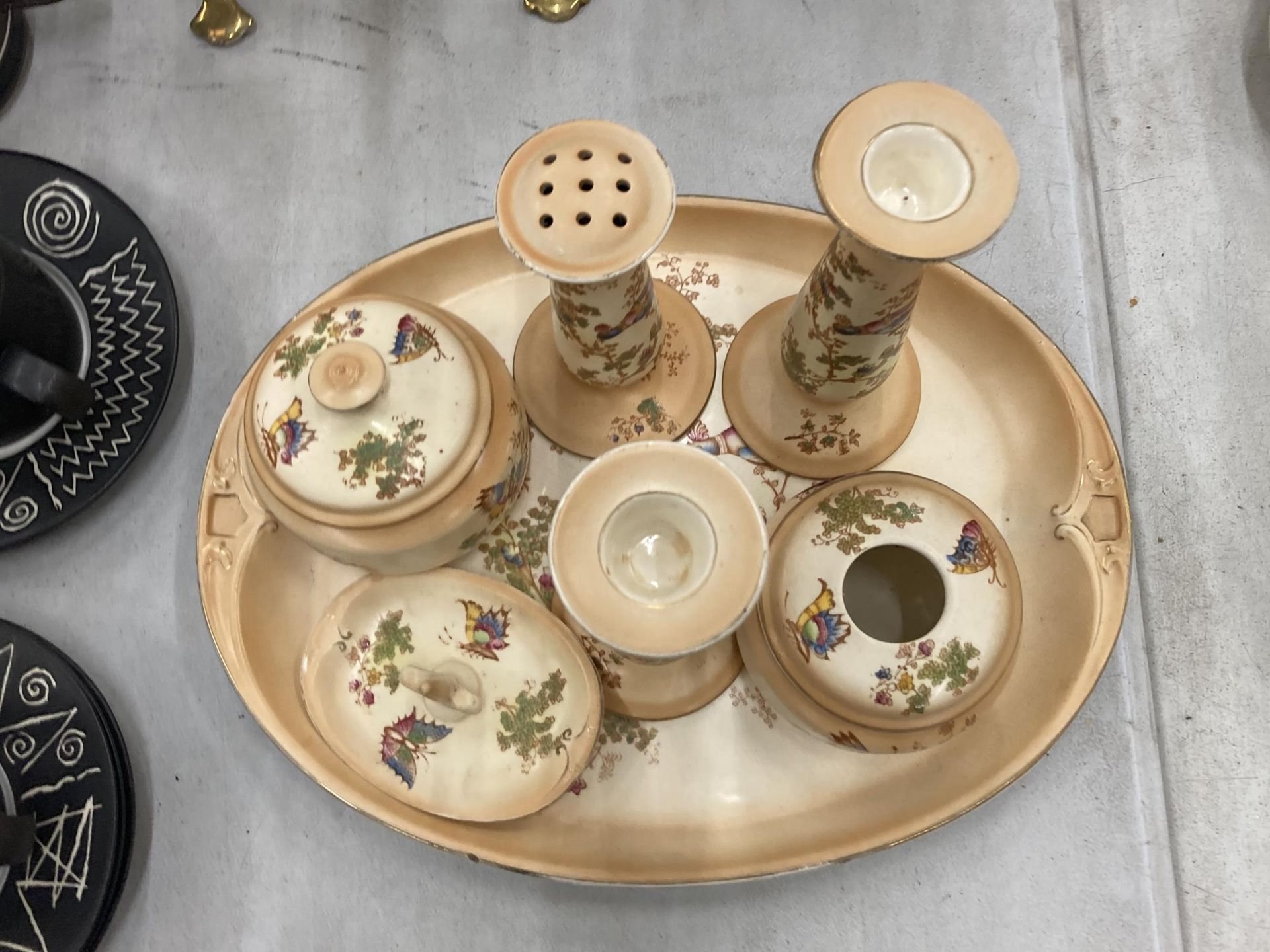 A VINTAGE CERAMIC DRESSING TABLE SET WITH BIRD AND FLORAL DESIGN