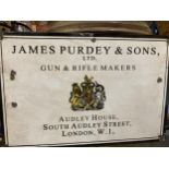 AN ENAMEL SIGN 'JAMES PURDEY & SONS', 38CM X 26CM