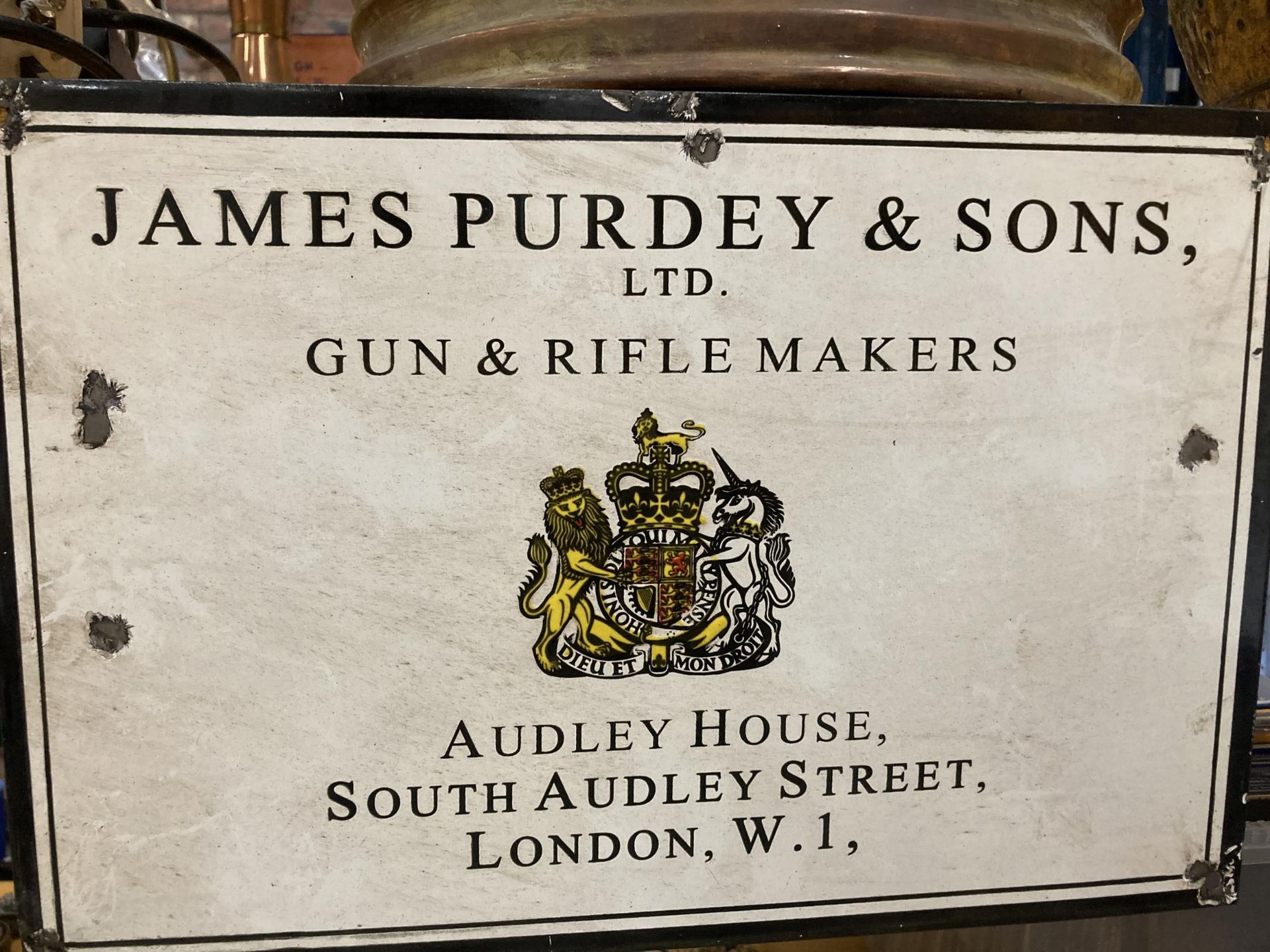 AN ENAMEL SIGN 'JAMES PURDEY & SONS', 38CM X 26CM