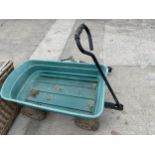 A FOUR WHEELED PLASTIC MARKET GARDENERS TROLLEY