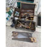 A LARGE ASSORTMENT OF TOOLS TO INCLUDE CHISELS, WOOD PLANES AND SAWS ETC