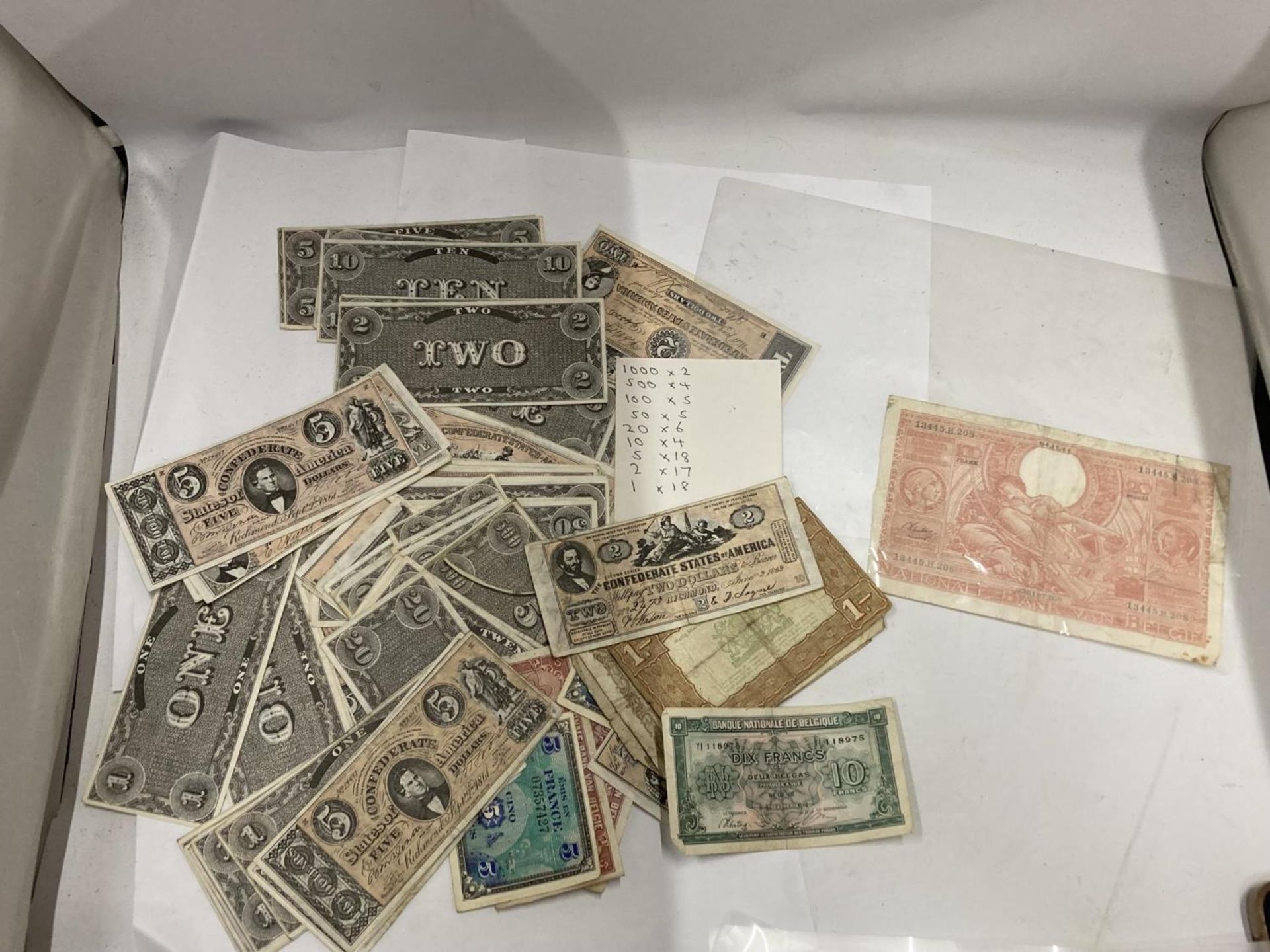 A LARGE QUANTITY OF BANK NOTES INCLUDING CONFEDERATE DOLLARS