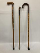 A GROUP OF THREE VINTAGE WALKING STICKS TO INCLUDE BADGED EXAMPLE