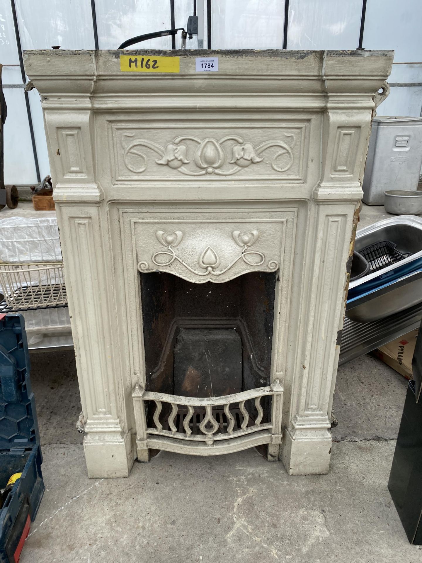 A VICTORIAN CAST IRON FIRE PLACE