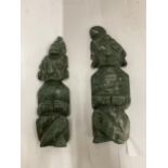 A PAIR OF MALACHITE TYPE STONE FIGURES