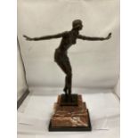 A REPRODUCTION ART DECO STYLE BRONZE MODEL OF A LADY WITH ARMS OUTSTRETCHED, SIGNED CHIPARUS
