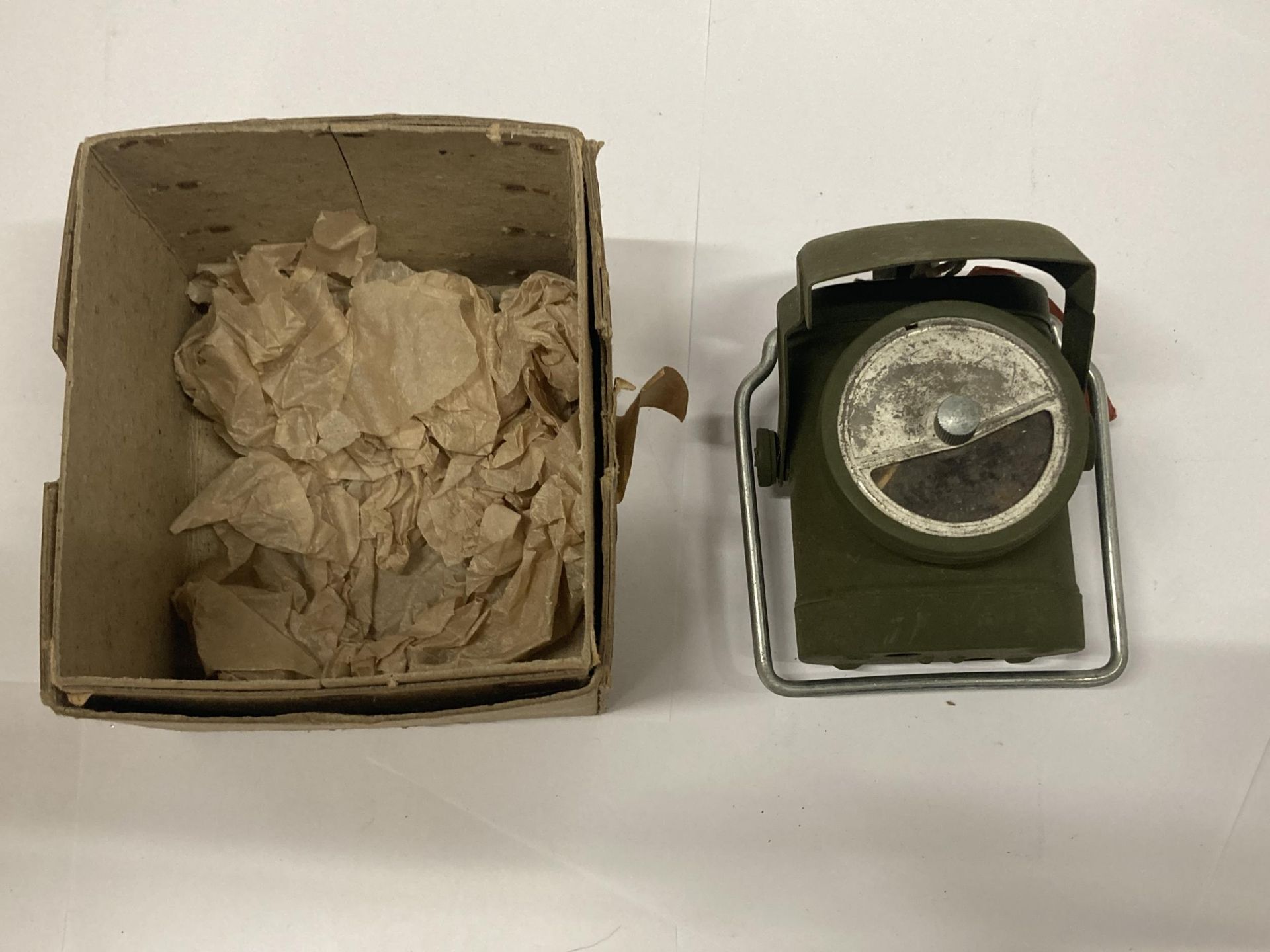 A WORLD WAR II BLACK OUT LAMP WITH ORIGIANAL BOX