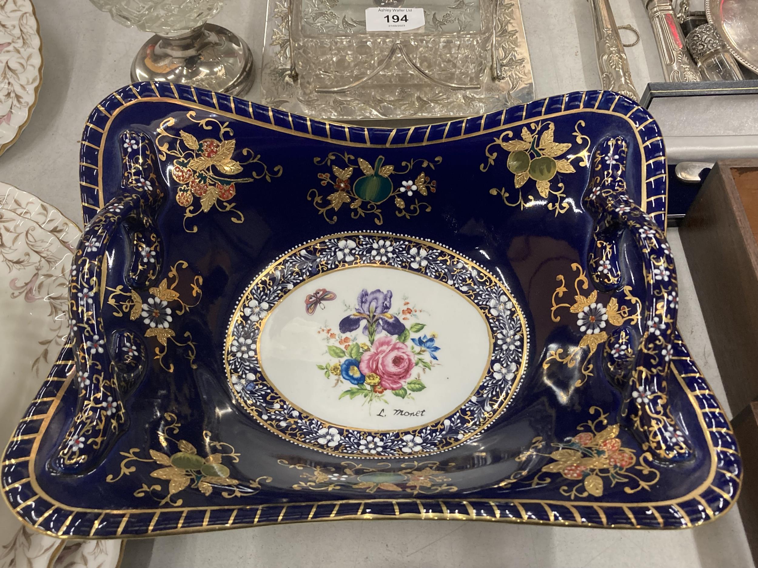 A COBALT BLUE AND GILT TWIN HANDLED BOWL WITH HAND PAINTED DESIGN, SIGNED L.MONET - Image 2 of 4