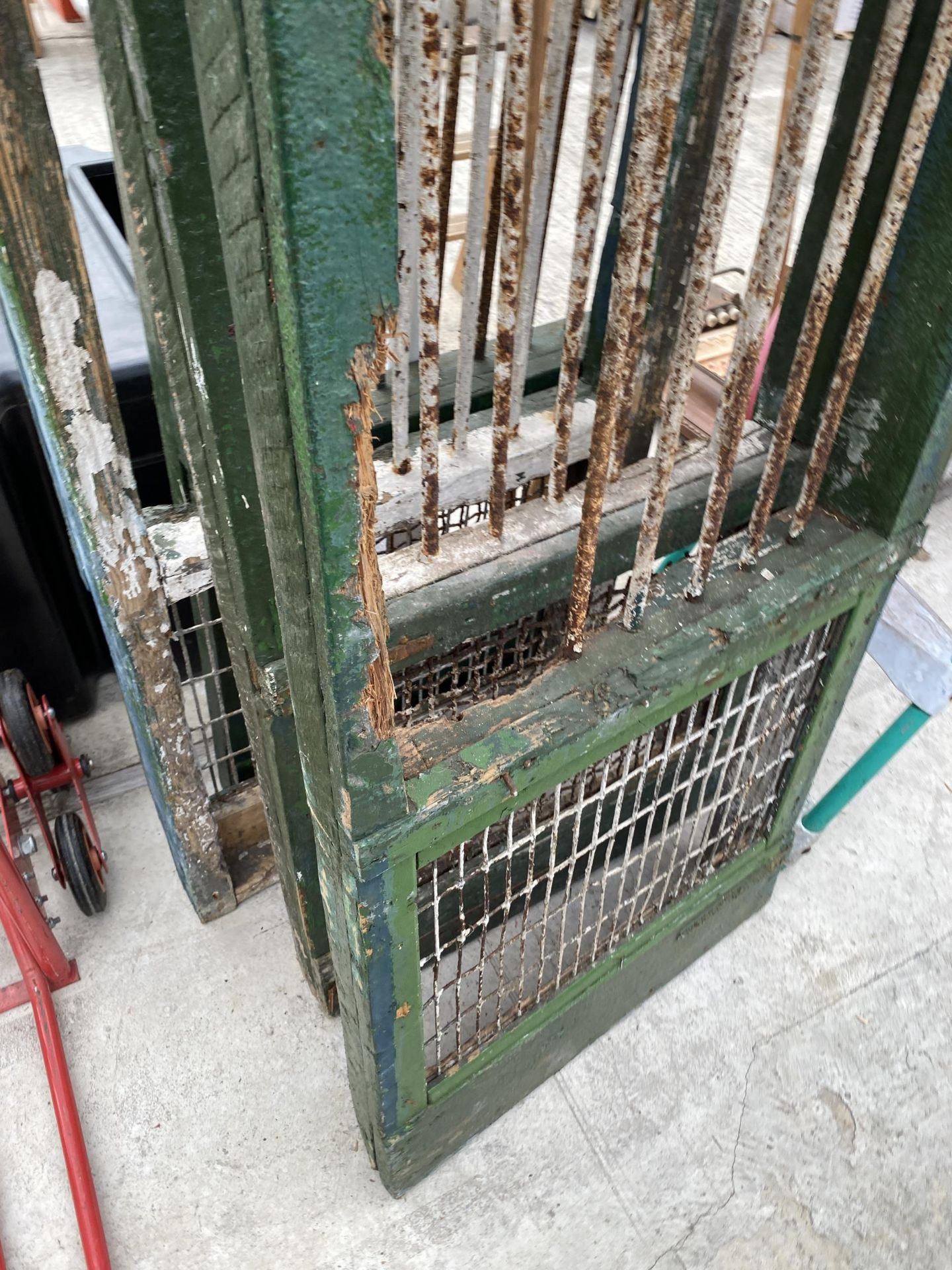 FOUR VINTAGE WOODEN DOORS WITH MESH BOTTOM SECTION AND STEEL BARS TO THE TOP SECTION - Image 3 of 3