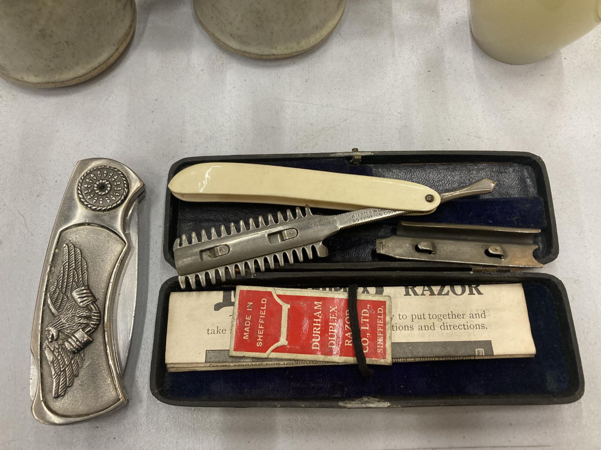 A BOXED VINTAGE DURHAM DUPLEX RAZOR AND EAGLE PEN KNIFE