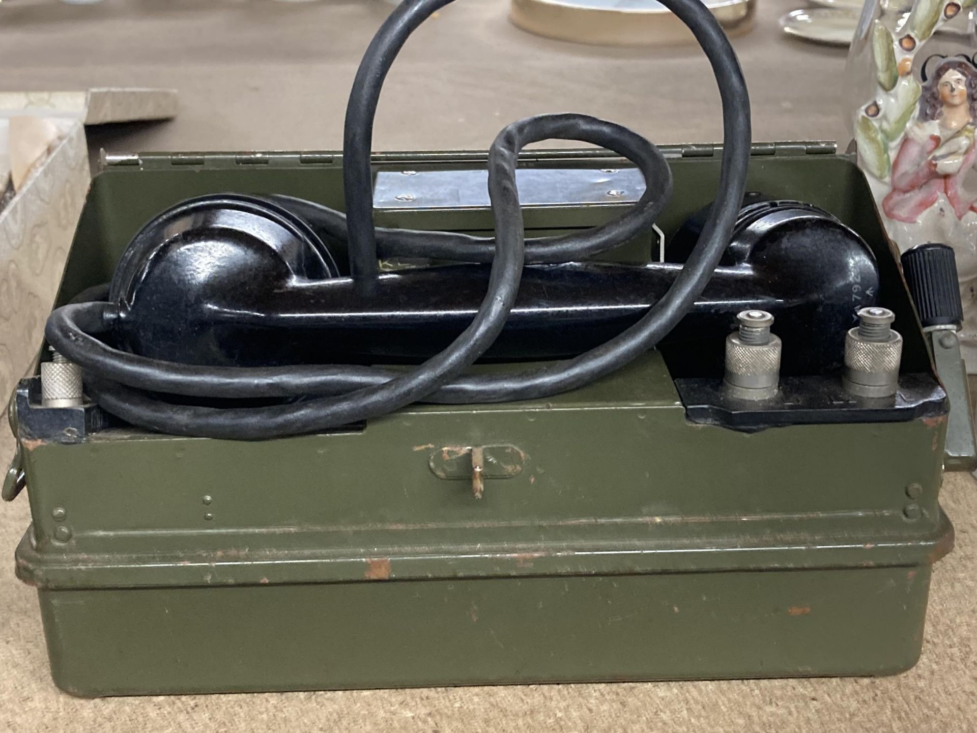 A MILITARY METAL CASED FIELD TELEPHONE 'J' SET / UNIT