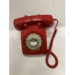 A VINTAGE RED TELEPHONE