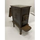 A SALESMAN'S SAMPLE CAST IRON STOVE