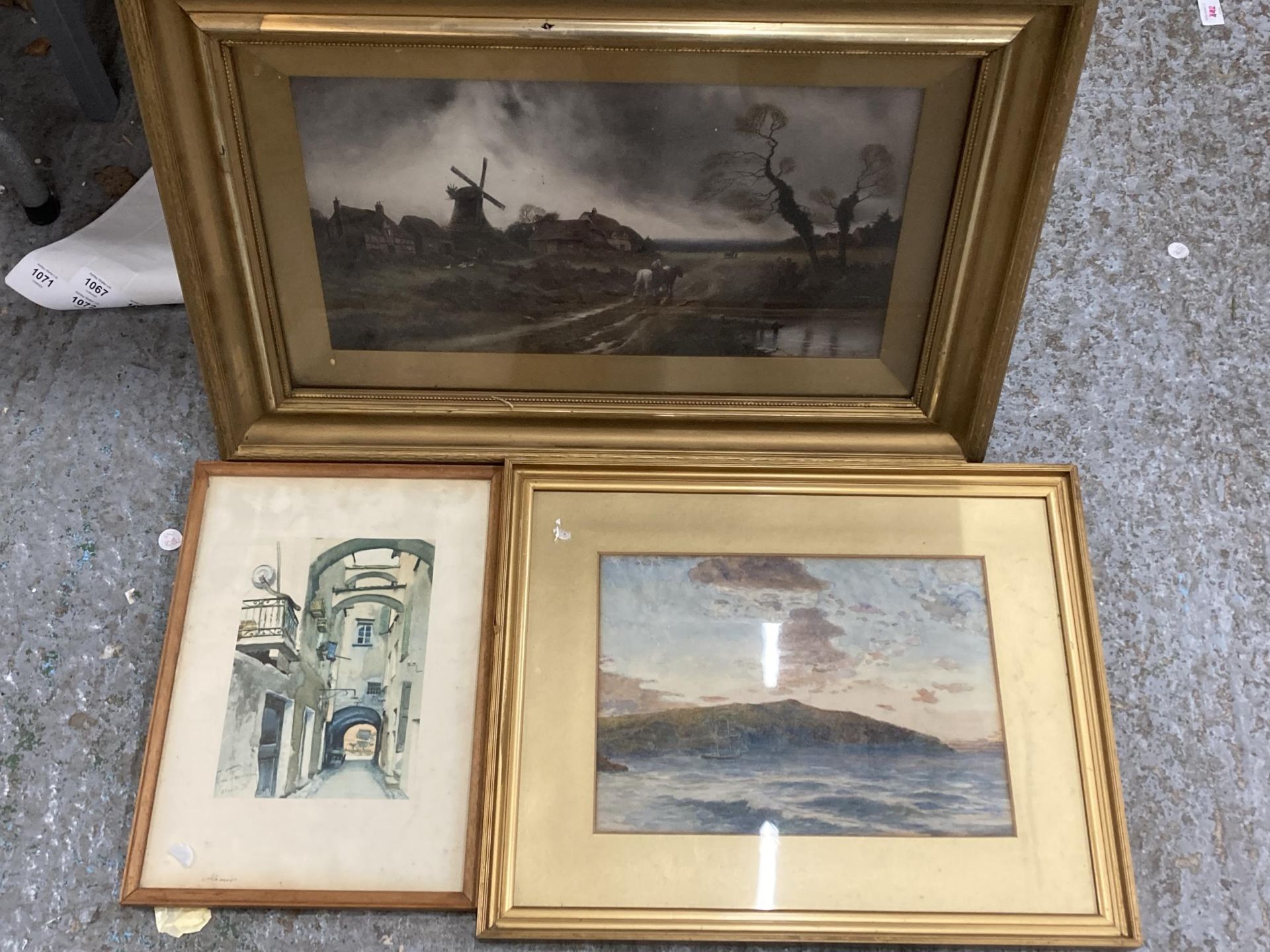 THREE FRAMED PAINTINGS - WATERCOLOUR OF A WINDMILL, STREET SCENE AND FURTHER EXAMPLE