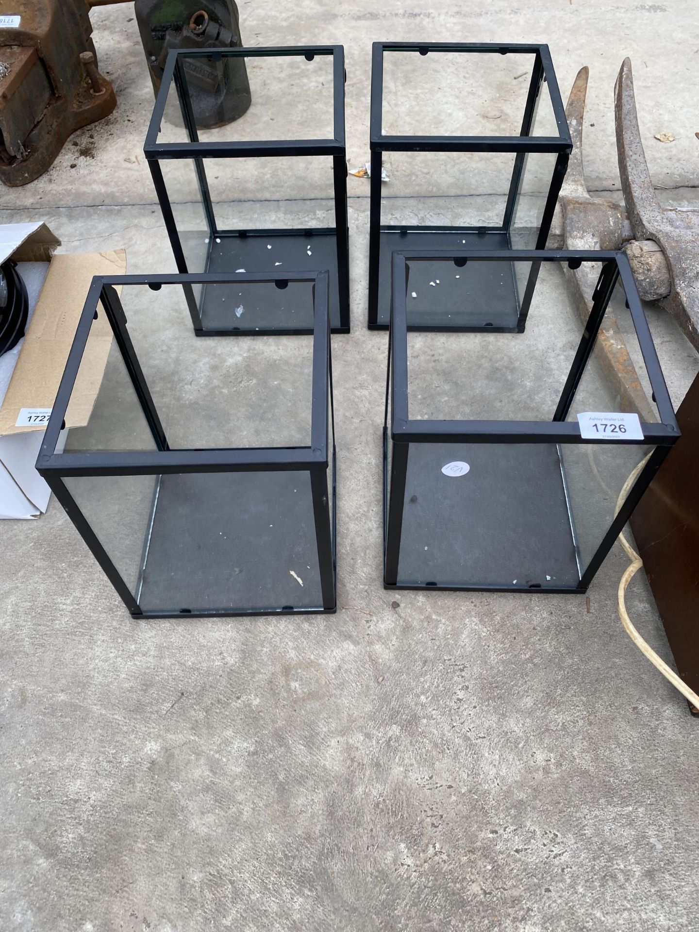 FOUR METAL AND GLASS CANDLE BOXES