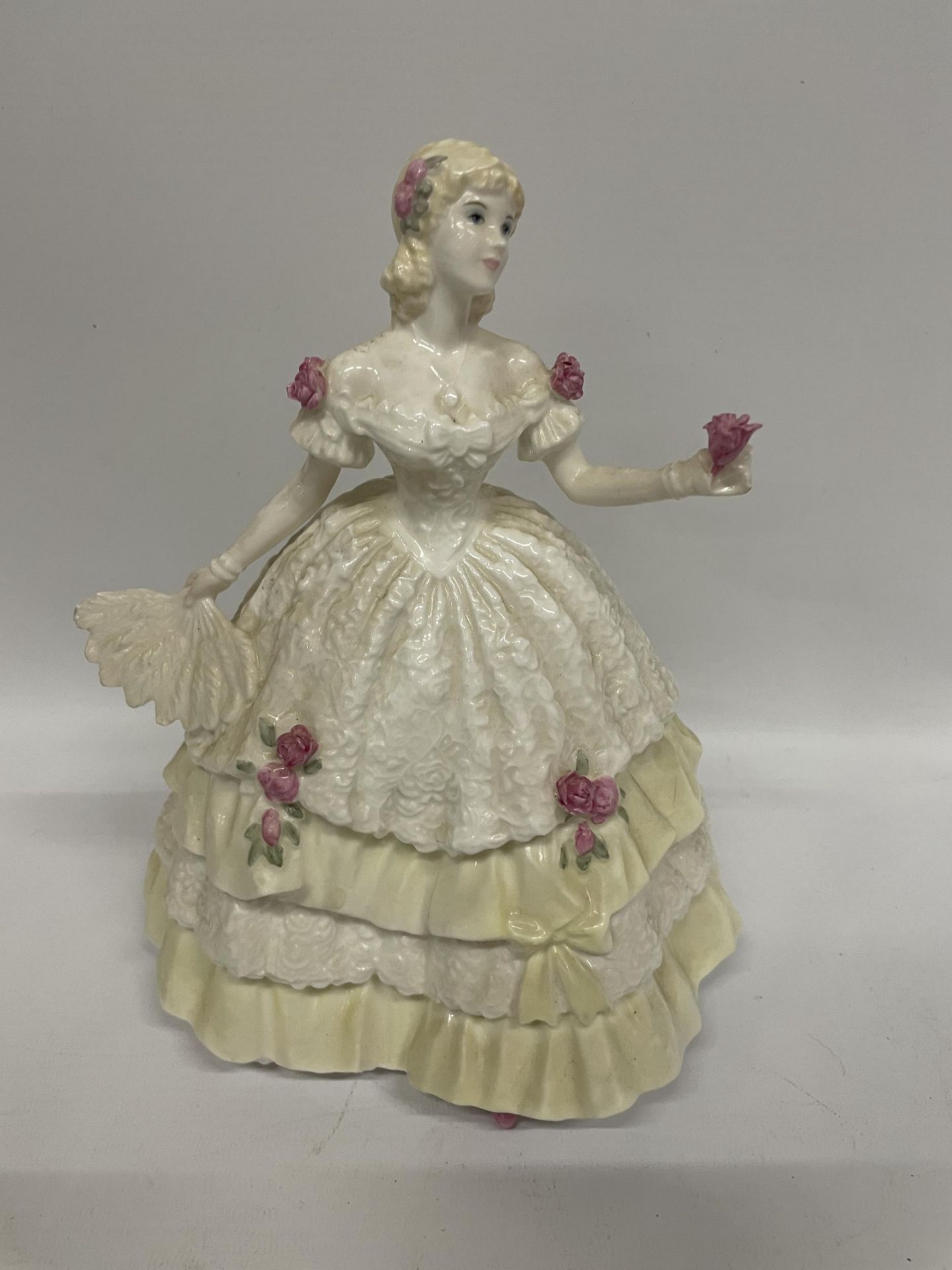 A COALPORT BONE CHINA LADY FIGURE