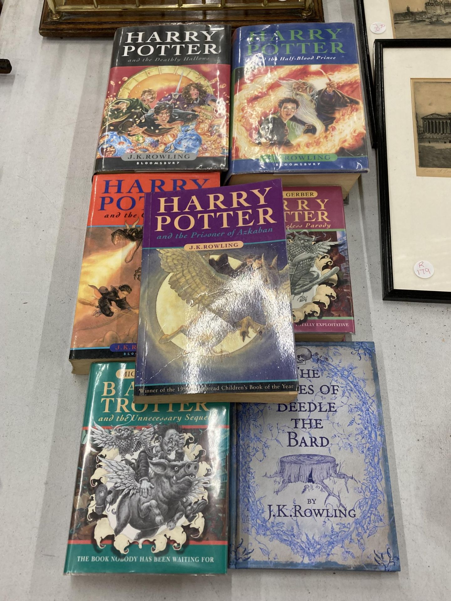 FOUR J K ROWLING HARRY POTTER BOOKS AND THE TALE OF BEEDLE THE BARD PLUS TWO BARRY POTTER BOOKS