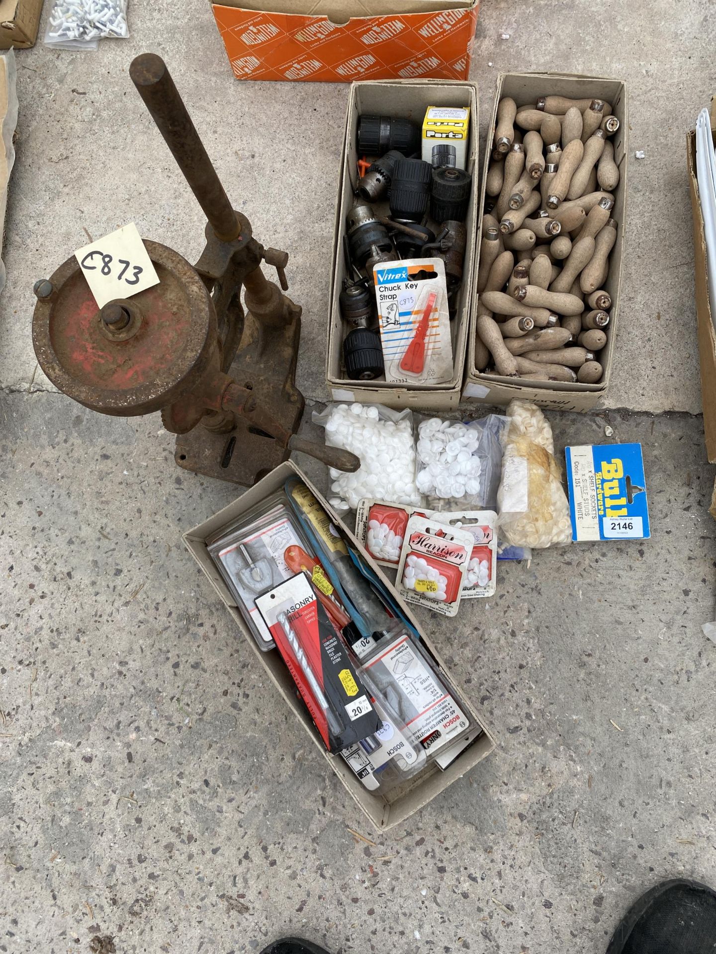 AN ASSORTMENT OF ITEMS TO INCLUDE A DRILL STAND, FILE HANDLES AND SCREW CAPS ETC