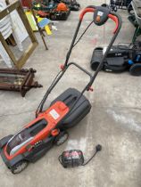 A BATTERY POWERED FLYMO MIGHTI-MO 300LI LAWN MOWER WITH BATTERY AND CHARGER