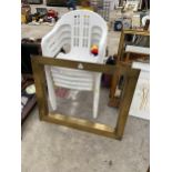 A BRASS COATED FRAME AND FOUR PLASTIC STACKING CHAIRS