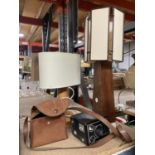 TWO WOODEN TABLE LAMPS AND A VINTAGE BROWNIE CAMERA